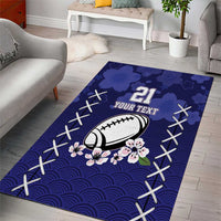 Blue sports area rug with football, cherry blossoms, wave pattern, stitched border, 21