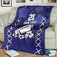 Blue rugby blanket on sofa, number 21 with custom text, football and floral wave pattern