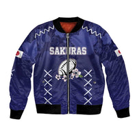 Blue satin bomber jacket with full zip, black ribbed trim, rising sun and cherry blossoms
