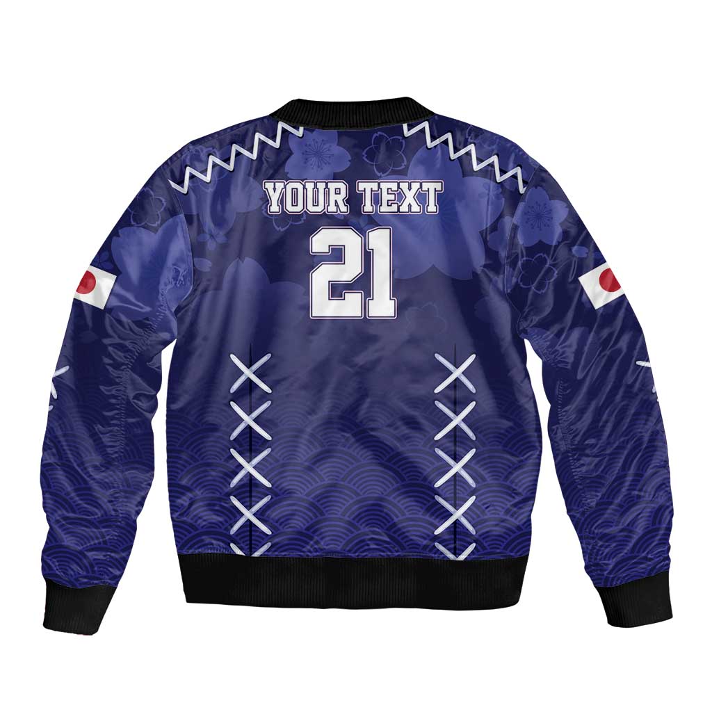 Blue bomber jacket back with 'YOUR TEXT 21', wave pattern and crossed stitch graphics