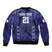 Blue bomber jacket back with 'YOUR TEXT 21', wave pattern and crossed stitch graphics