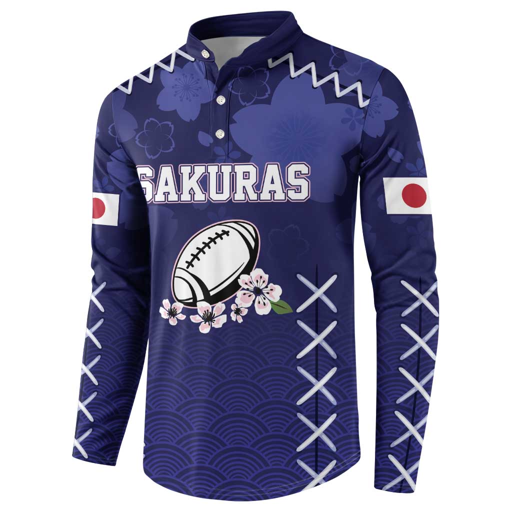 Navy rugby button sweatshirt, front view with SAKURAS text, rugby ball and blossoms, waves