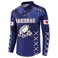 Navy rugby button sweatshirt, front view with SAKURAS text, rugby ball and blossoms, waves