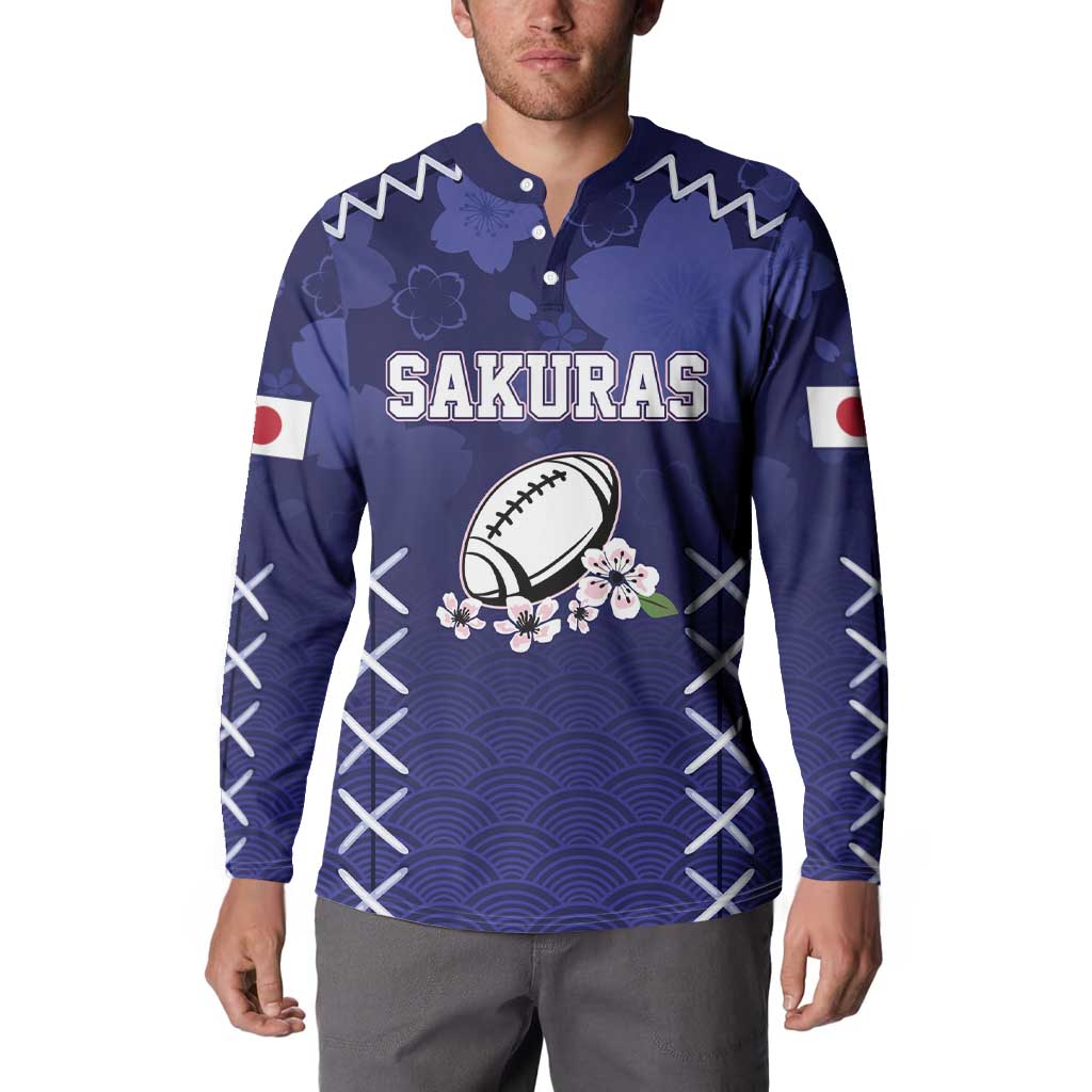 Navy rugby button sweatshirt, front 'SAKURAS' graphic with rugby ball and flowers, wave hem