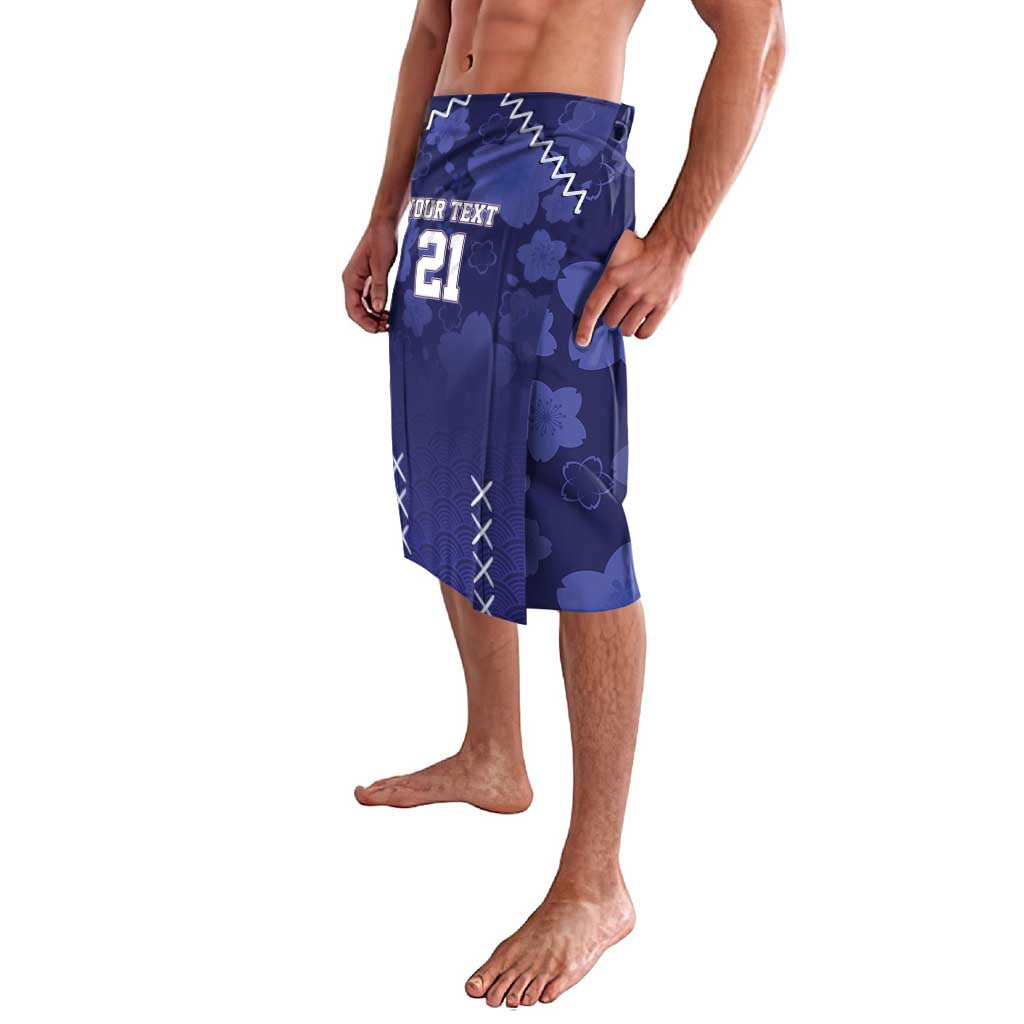 Blue custom rugby shorts, side view with floral and wave pattern and 'YOUR TEXT' 21