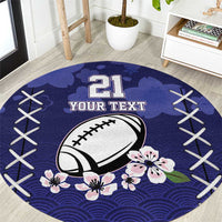 Navy-blue round area rug with “21 YOUR TEXT”, football graphic, flowers, and white crisscross lines