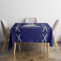 Blue rectangular tablecloth with wave pattern and white X motifs, neatly draped