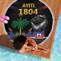 Round black beach blanket with fringe edge, AYITI 1804 design with palm and fist