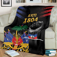 Black throw blanket draped on armchair with blue-red stripes, palm tree, and fist