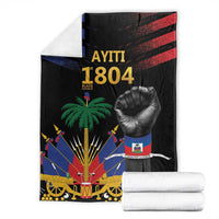Black Haiti-themed blanket with folded display, showing gold AYITI 1804, palm tree, fist