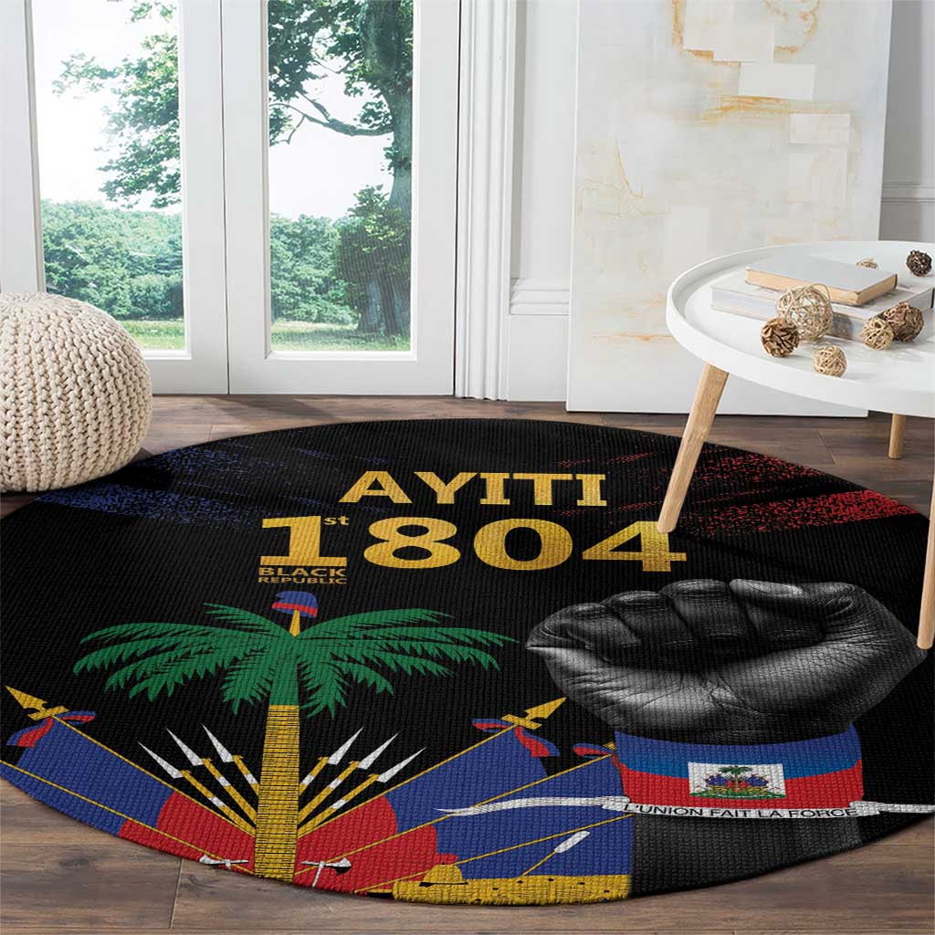 Round black rug with 'AYITI 1804' lettering, raised fist and colorful Haiti flag pattern