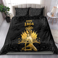 Black duvet and two pillowcases with gold Ayiti 1804 center print and dark pattern