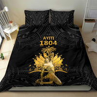 Black duvet and two pillowcases with gold Ayiti 1804 print and ornate tribal pattern