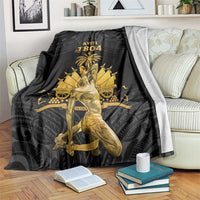 Black Polynesian pattern blanket with gold Ayiti 1804 figure and palm graphic