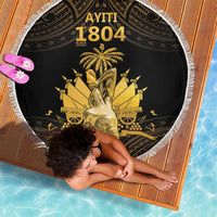 Round beach blanket with fringed edge, black and gold graphic center design