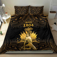 Black bedding set with gold ornamental pattern, duvet cover, and two matching pillow shams.
