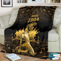 Black and gold Polynesian pattern throw blanket with 'AYITI 1804' on couch