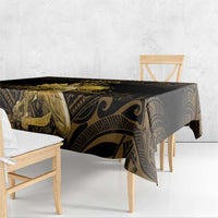 Black and gold Polynesian tablecloth with patterned panel and overhang