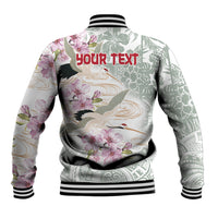 Baseball jacket with green-and-white floral bird print, ribbed hem; back shows 'Your text'