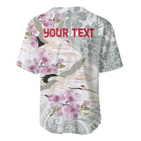 White baseball jersey with crane and sakura floral tropical print, 'YOUR TEXT' on back