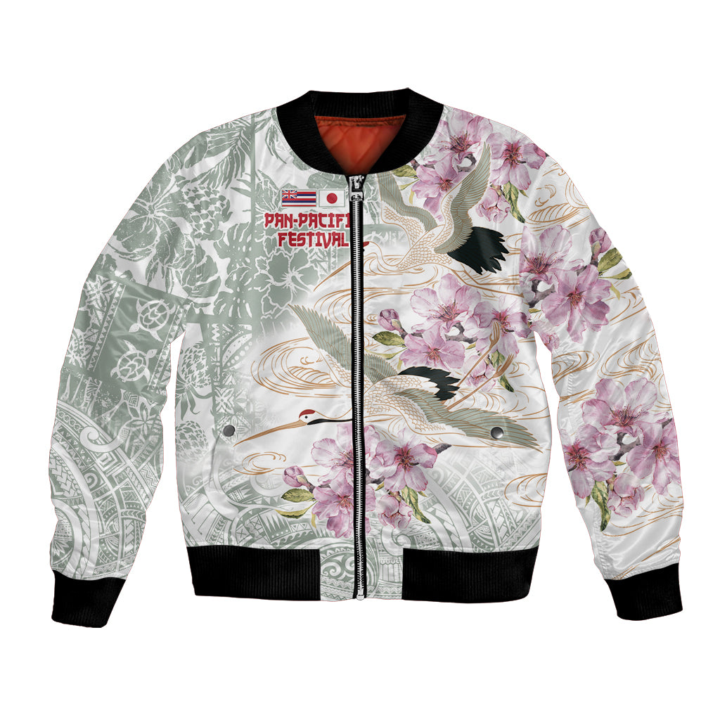Unisex bomber jacket with full-zip front, green-white floral and bird print, black ribbing