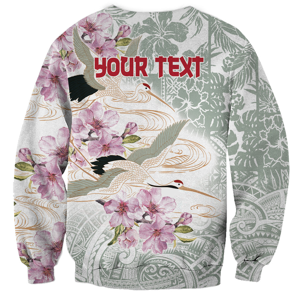 Long-sleeve crewneck sweatshirt with crane and pink flowers, 'YOUR TEXT' on back