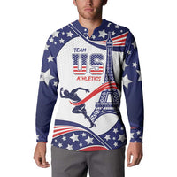 Blue button hooded sweatshirt worn by model with USA stars and athletics graphic
