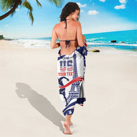 Blue and white star-patterned sarong with monument graphic and personalized text