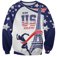 Blue and white crewneck sweatshirt with USA stars, Eiffel tower, and Team US Athletics print