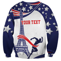 Blue and white crewneck sweatshirt with star pattern, Eiffel tower, and Your Text graphic