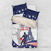 USA basketball bedding set laid flat: blue star pillows with white quilt and red stripes