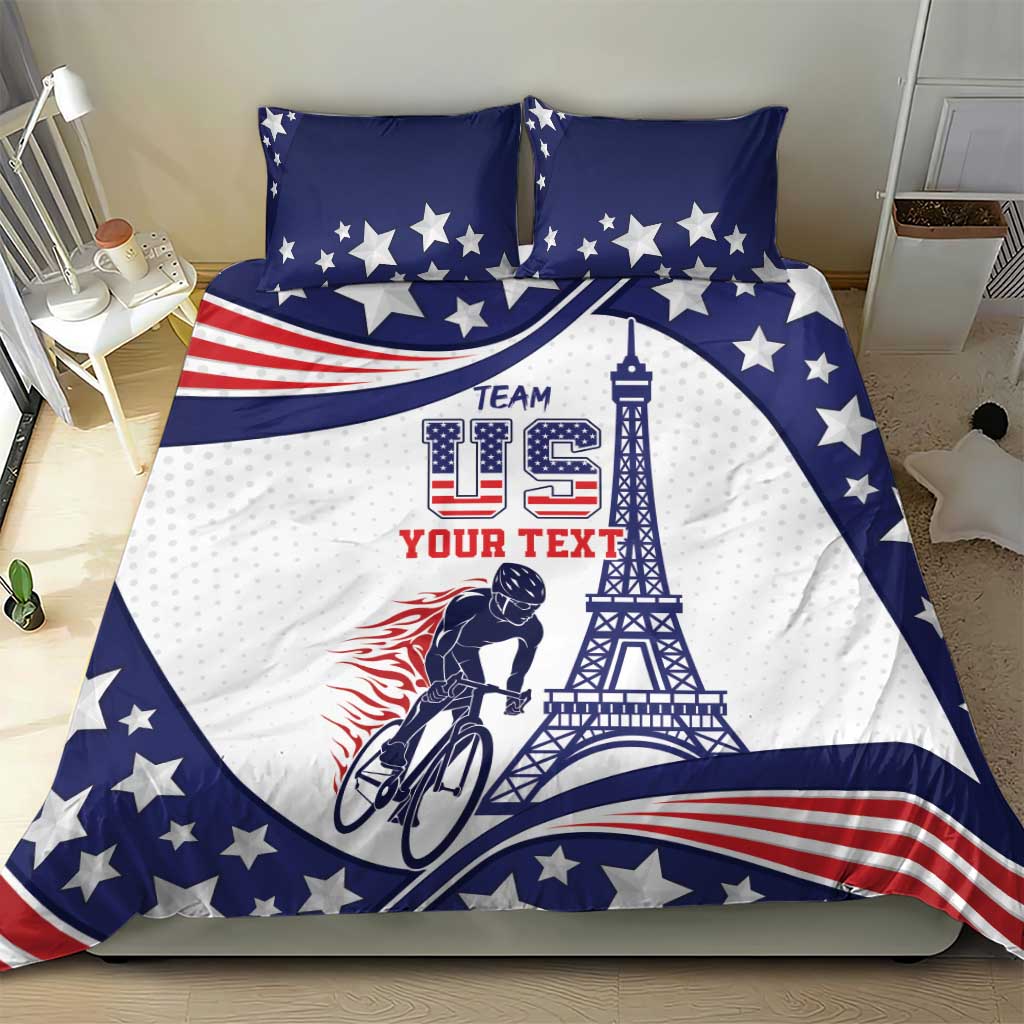 Blue and white USA-themed bedding set on bed with stars, Eiffel tower, bicycle design, two pillows