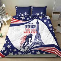 Blue and white USA-themed bedding set on bed with stars, Eiffel tower, bicycle design, two pillows