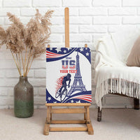 Blue canvas wall art on wooden easel, cyclist and Eiffel Tower with stars and stripes