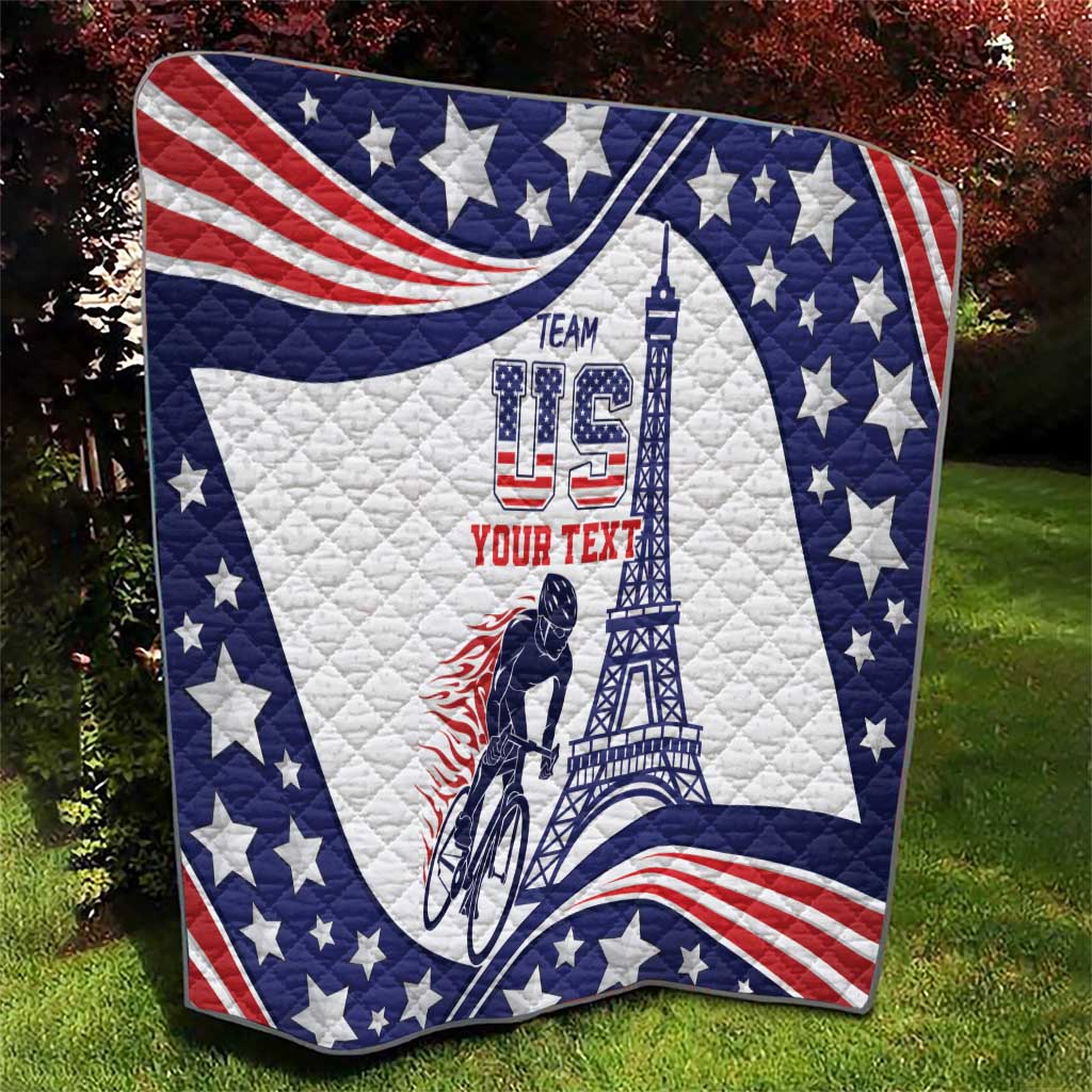 Personalized USA cycling quilt laid on grass, blue stars, red stripes, cyclist and Eiffel artwork