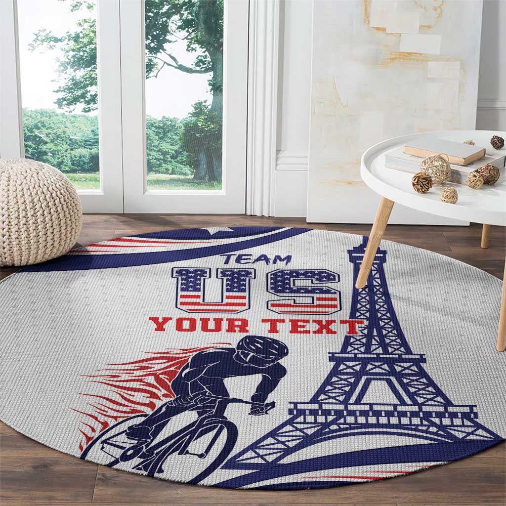 Round grey rug with cyclist silhouette and Eiffel Tower design, blue TEAM and red letters
