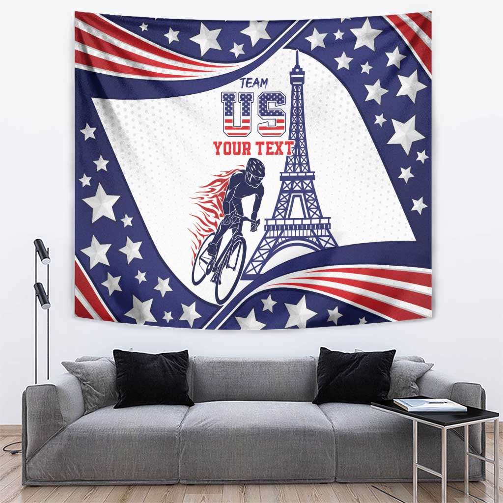 Patriotic USA cycling tapestry with stars, red-white wave stripes, Eiffel tower, and rider.