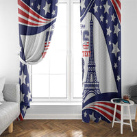 Blue and red USA window curtains framing a white door and window, with Eiffel Tower print.