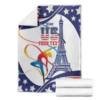Folded gymnastics blanket, blue and white stars with gymnast and tower graphic