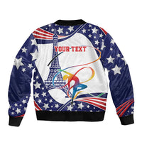 Blue bomber jacket with stars, tower and gymnastics graphic; 'YOUR TEXT' on front.
