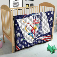 Personalized USA gymnastics quilt on bed, blue star border with red-white stripes and Eiffel