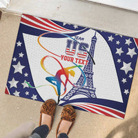 Blue rubber doormat on porch showing gymnast graphic, stars, and Eiffel Tower design
