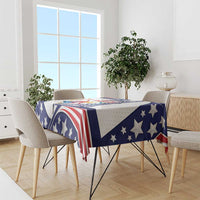 Blue and red patriotic tablecloth with star pattern and USA gymnastics-themed design on dining table