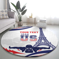 Round sports carpet on living room floor, white with blue-red team swimmer and Eiffel Tower