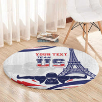 Round sports carpet on wood floor, white with blue-red team swimmer and tower print