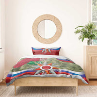 Camouflage bedding set on bed with two pillowcases; central '23' star rosette and stripes