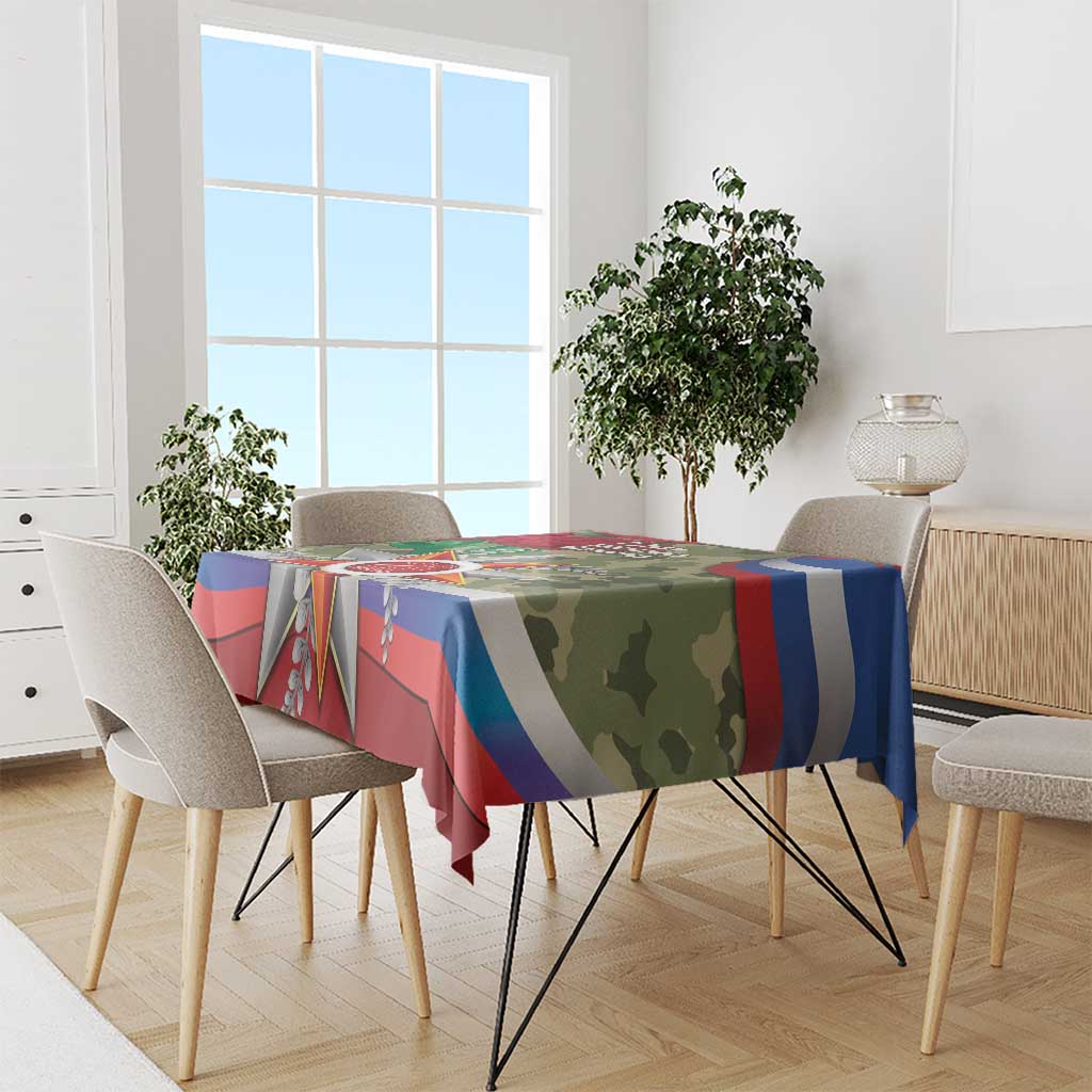 Patriotic tablecloth with blue, red, and green camo graphics and star ornament