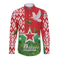 Red button shirt with white geometric sleeves, dove and star graphic on front