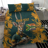 Green and yellow bedding set featuring gazelle mascot and South Africa text, two matching pillows
