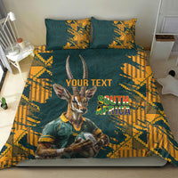 Green and yellow duvet cover set with gazelle mascot and South Africa text, two pillows